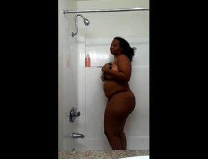 Plump ebony Mummy strokes in bathroom and leaves behind to